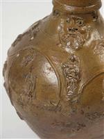 H2008-0063 detail.jpg; H2008-0063; Steengoed kan met lintoor op standvoet gedecoreerd met baardmanmasker, Maria met kind, engelen, leeuw, hert en ranken (zoutgeglazuurd); kan